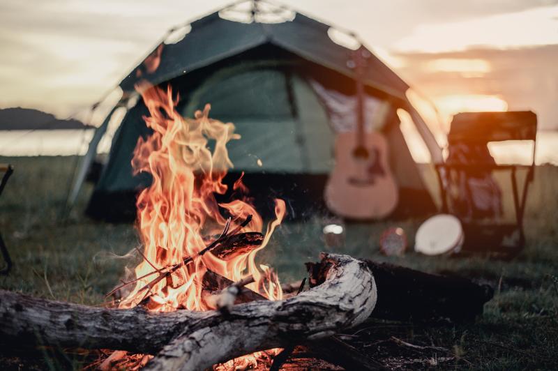 Campsite with fire and guitar